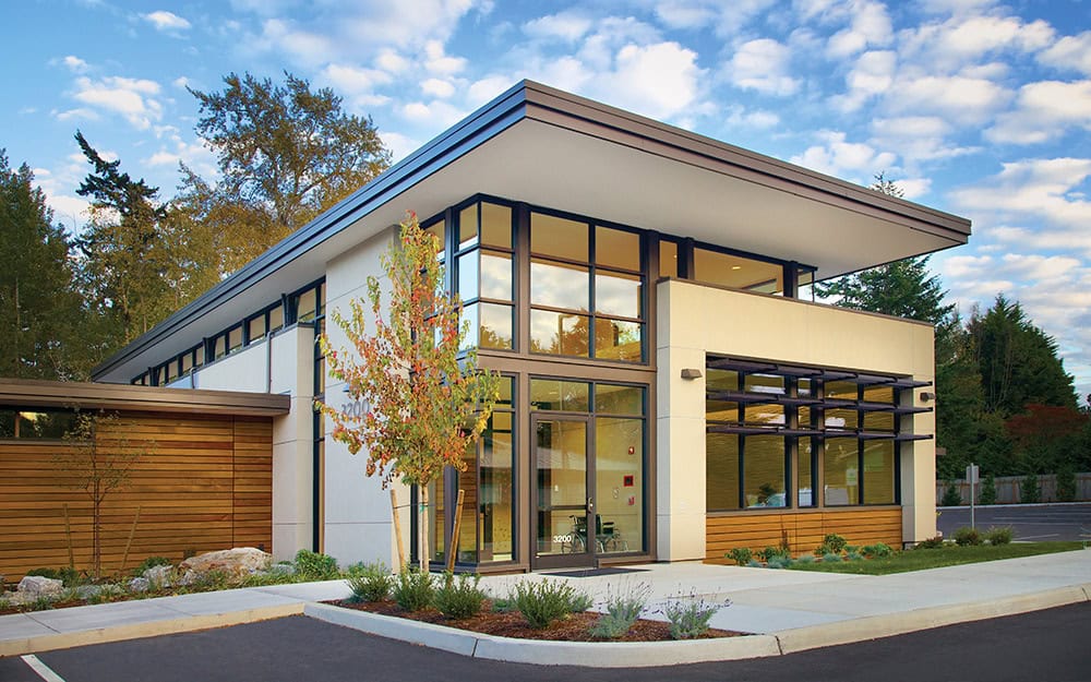 Modern medical office building with large glass windows and contemporary design.