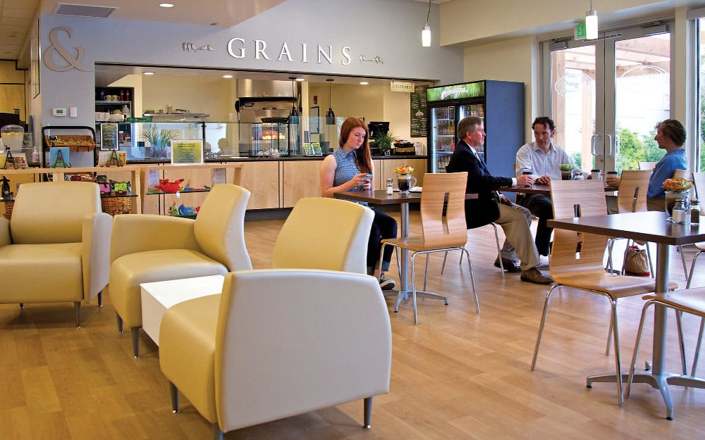 Bright interior of PeaceHealth East Tower Café with modern seating and natural light.