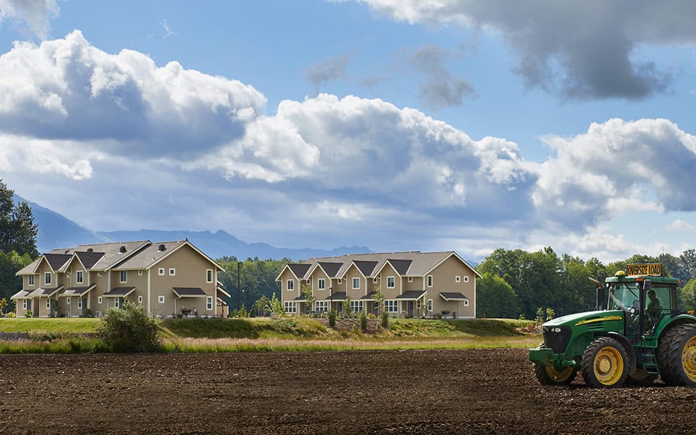 Modern farmworker housing in Skagit County with scenic mountain views.
